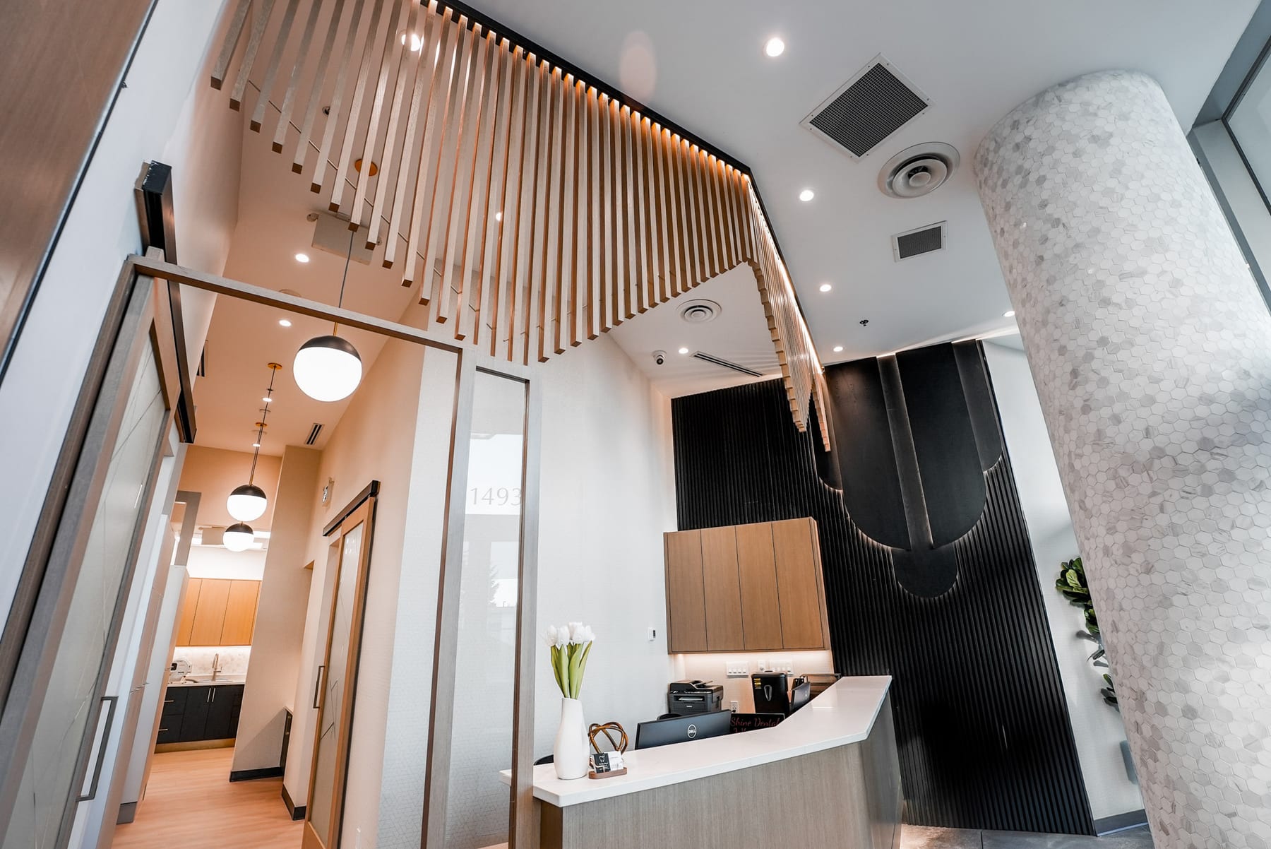 Slatted timber ceiling above the reception at The Shine Dental, White Rock, BC